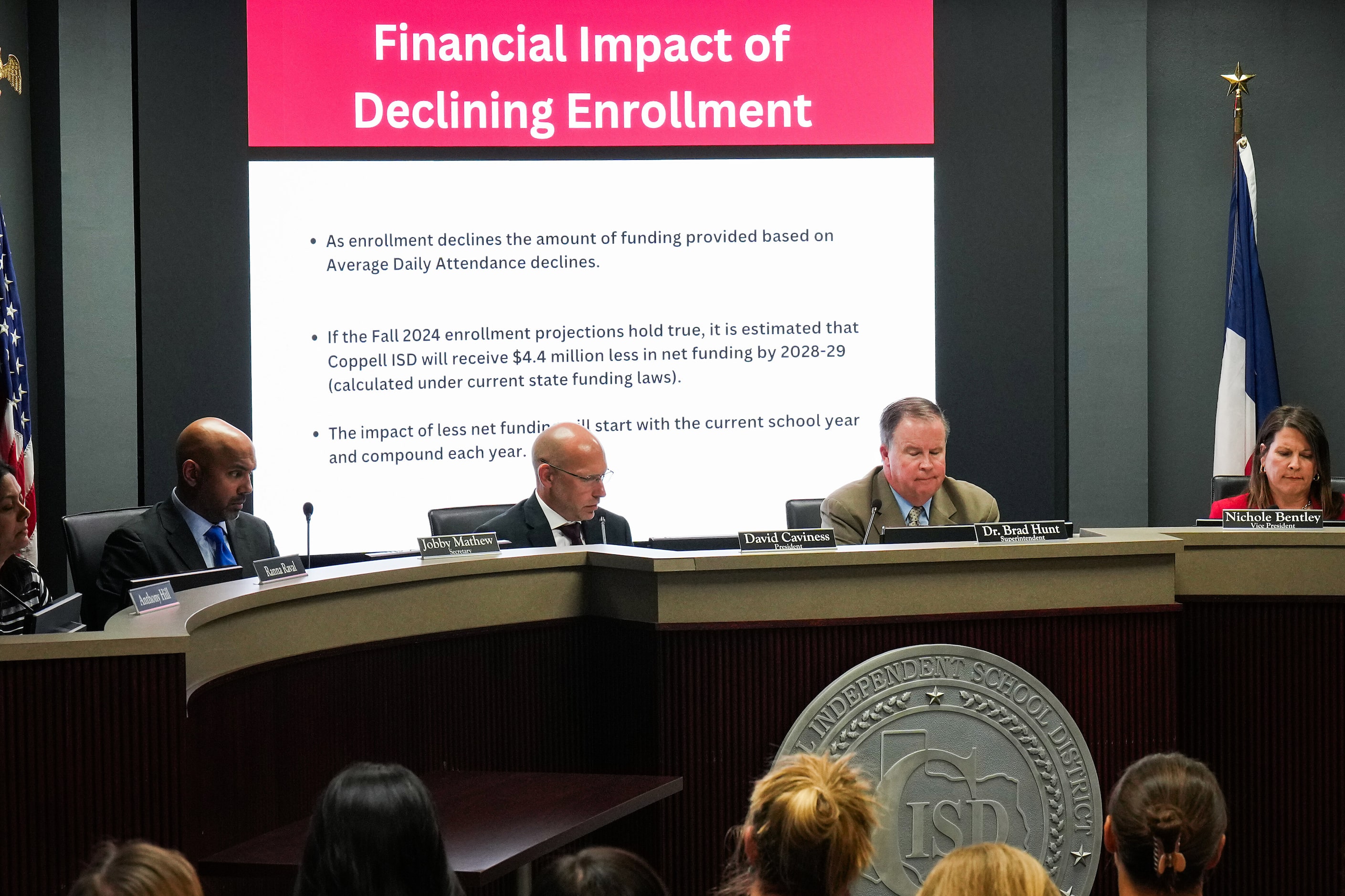 From left, Coppell ISD school secretary Jobby Mathew, president David Caviness,...