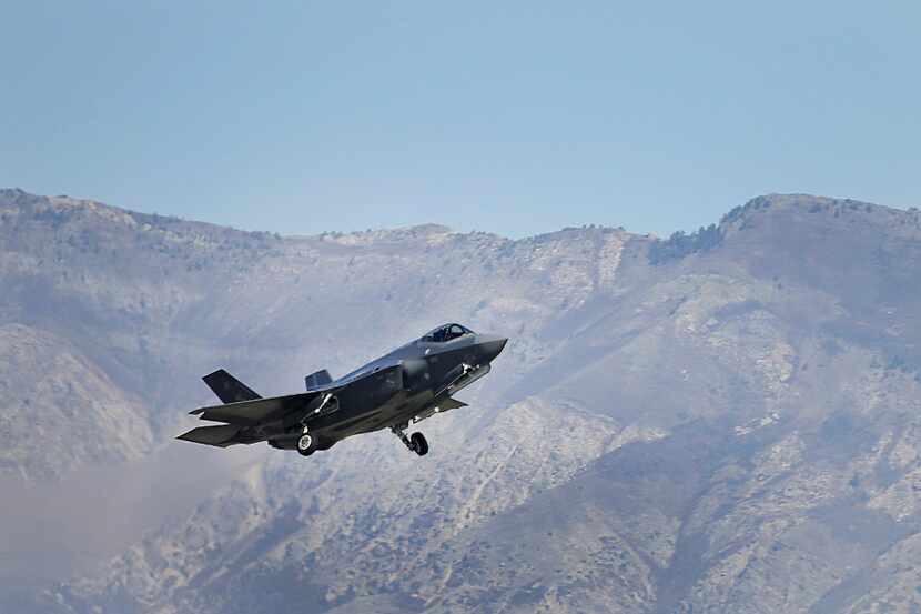 A Lockheed Martin Corp. F-35A jet flies during a training mission in Hill Air Force Base,...