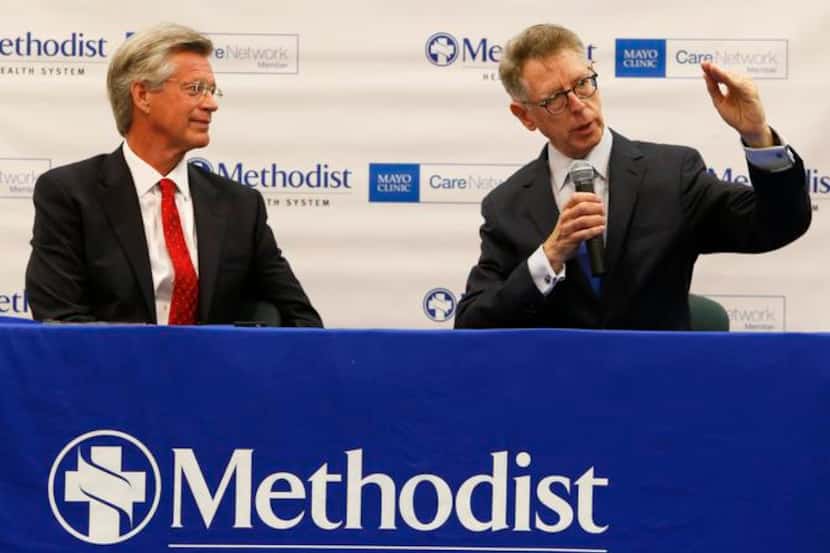 
Stephen Mansfield (left), president and CEO of Methodist Health System, and Dr. David...