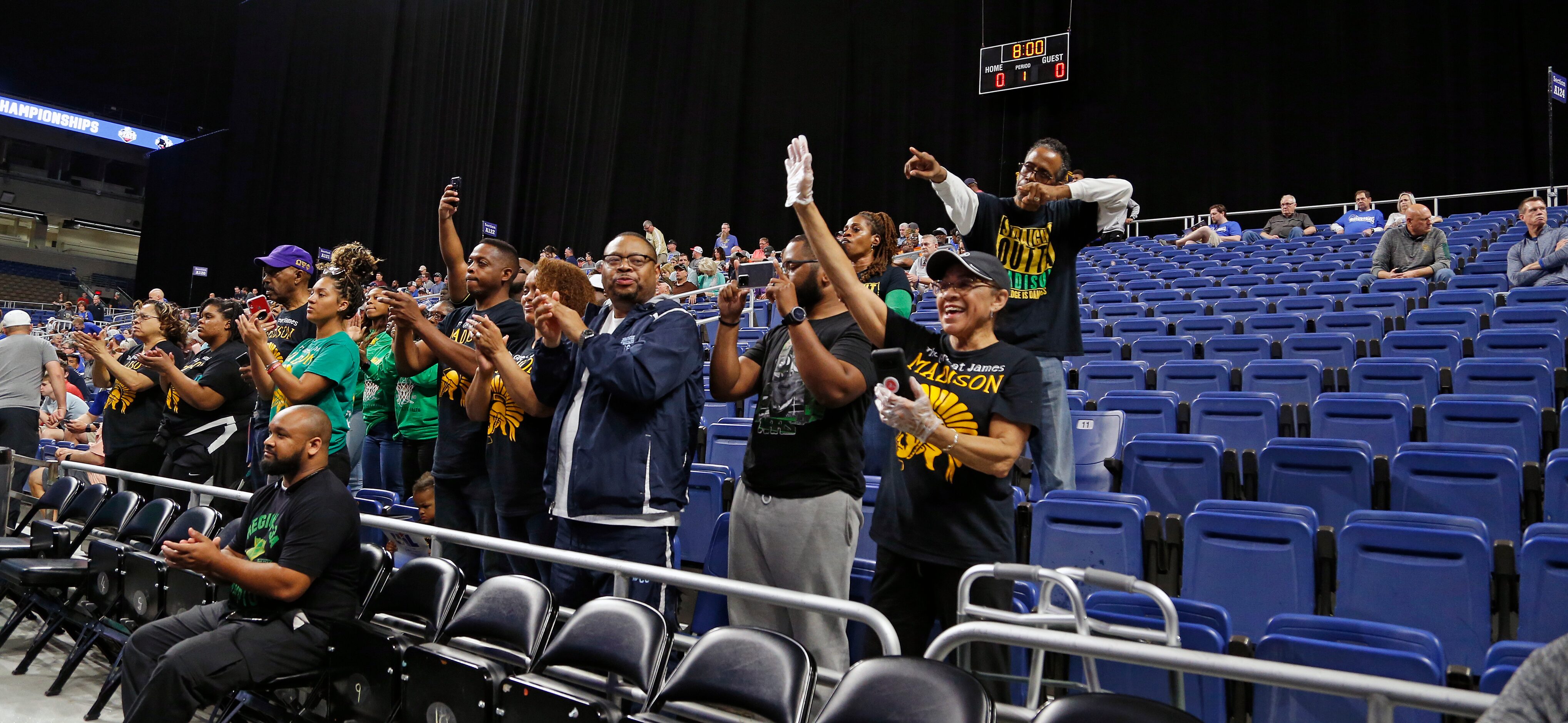 Madison fans cheer as their team is announced. Madison defeated Coldspring-Oakhurst 90-73....