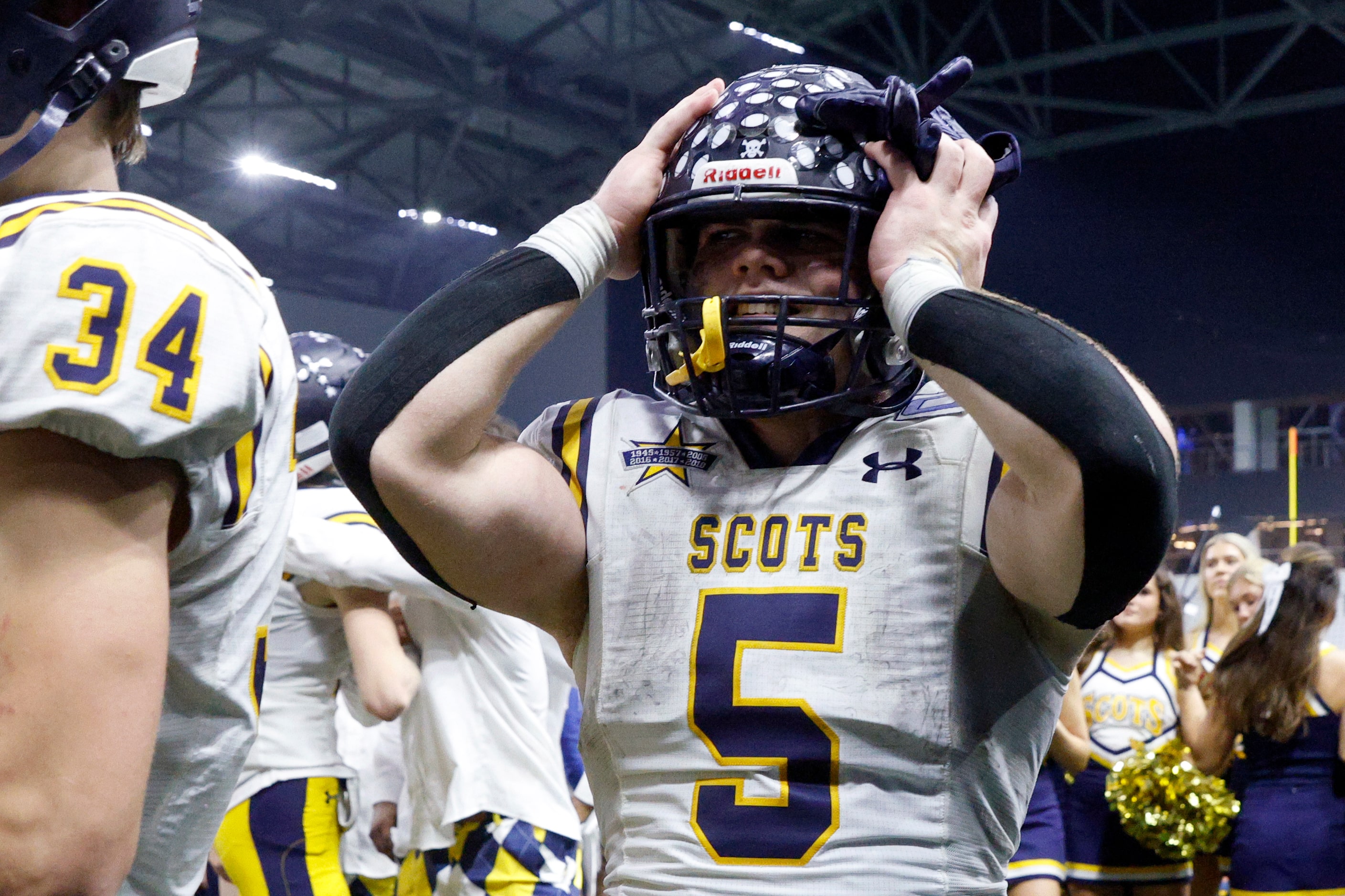 Highland Park running back James Lancaster (5) reacts after winning a Class 5A Division I...