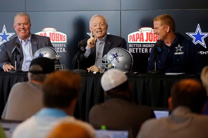 Dallas Cowboys owner Jerry Jones, center, answered questions next to executive vice...