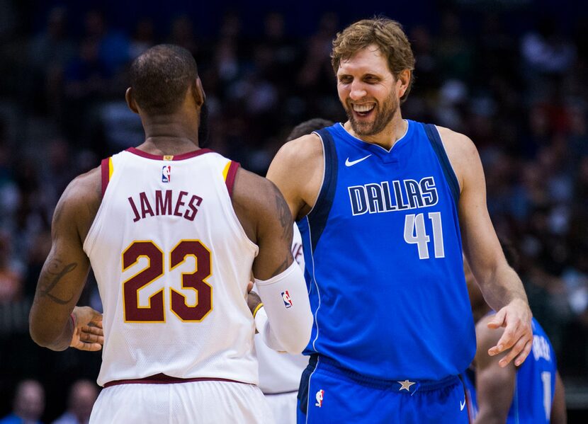 Dallas Mavericks forward Dirk Nowitzki (41) greets Cleveland Cavaliers forward LeBron James...