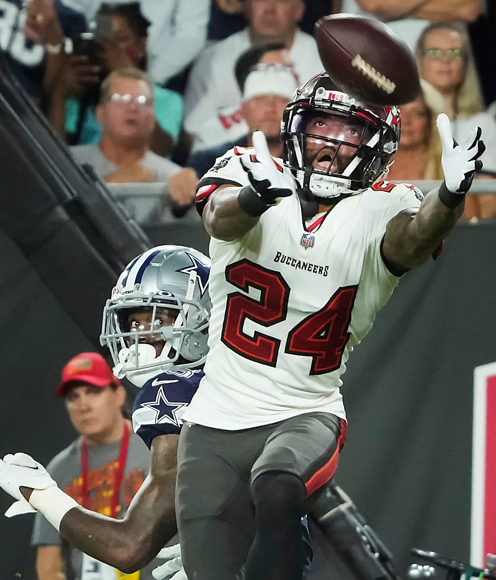 Tampa Bay Buccaneers cornerback Carlton Davis (24) breaks up a pass in the end zone intended...