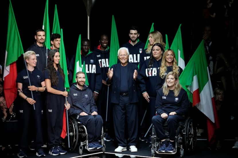 Designer Giorgio Armani with Italy's Paralympic team at the end of the Emporio Armani men's...