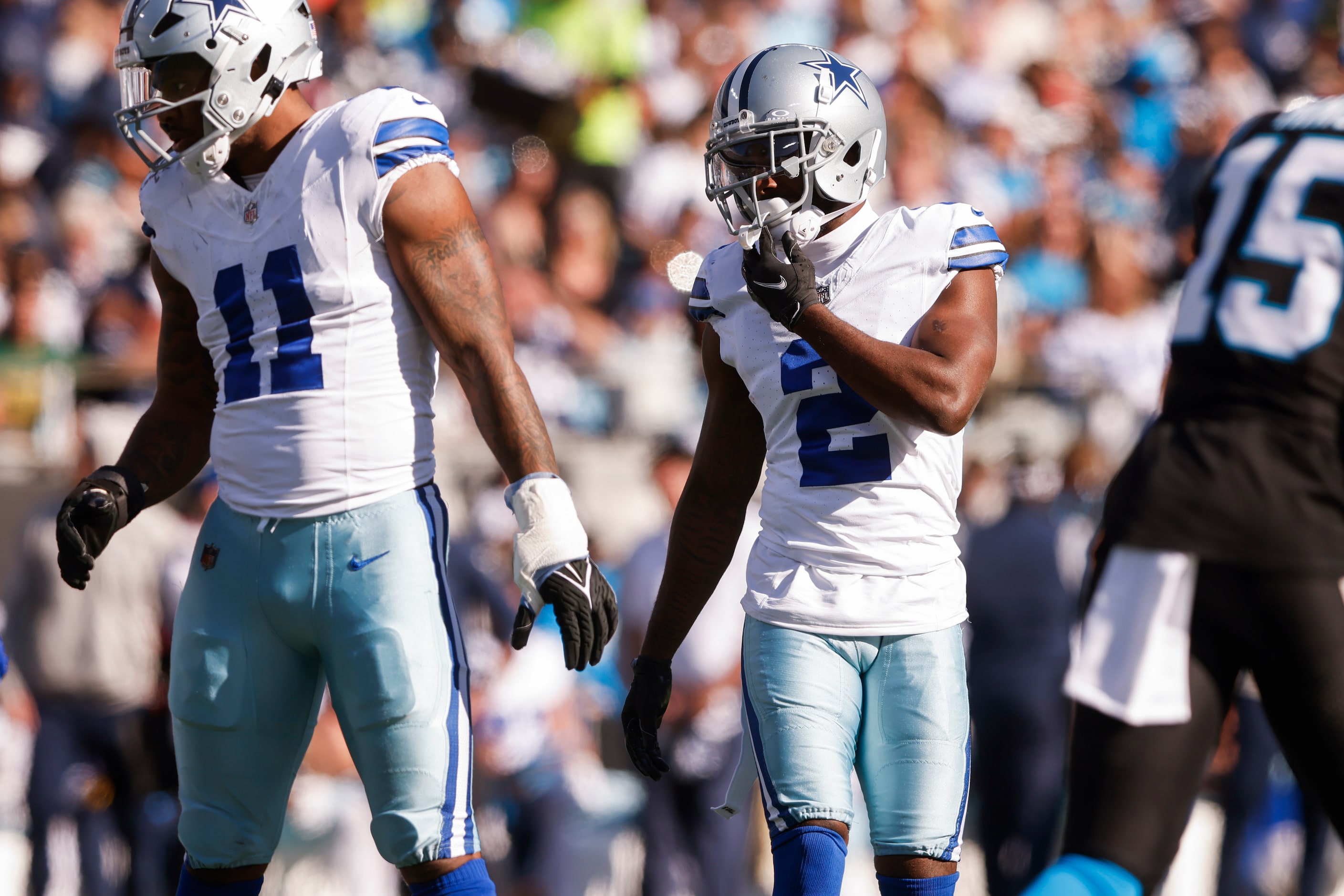 Dallas Cowboys linebacker Micah Parsons (11) and Dallas Cowboys cornerback Jourdan Lewis (2)...