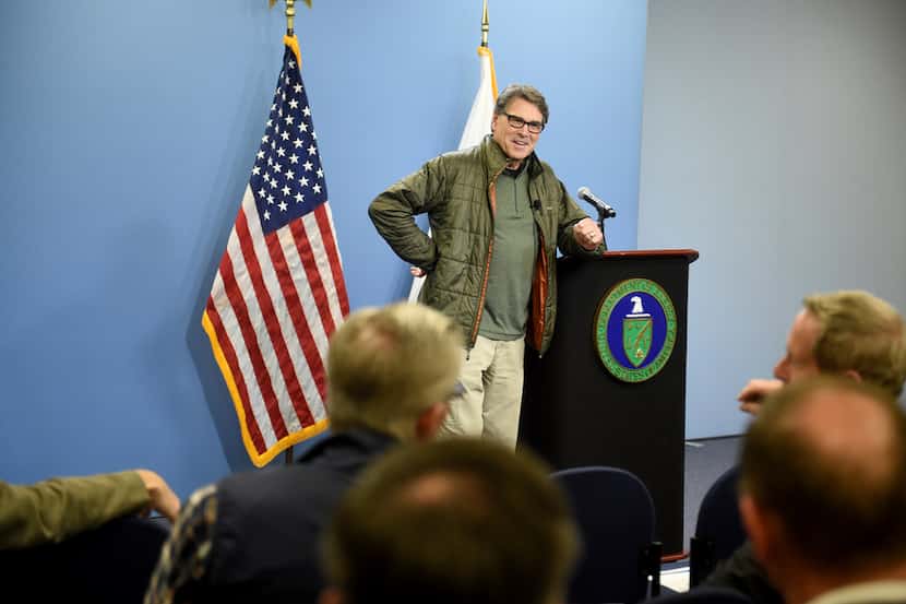 United States Energy Secretary Rick Perry speaks to a group of workers during a visit to the...