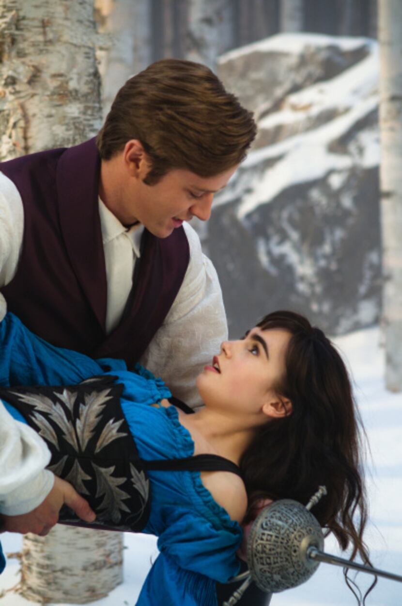 In this film image released by Relativity Media, Armie Hammer and Lily Collins are shown in...