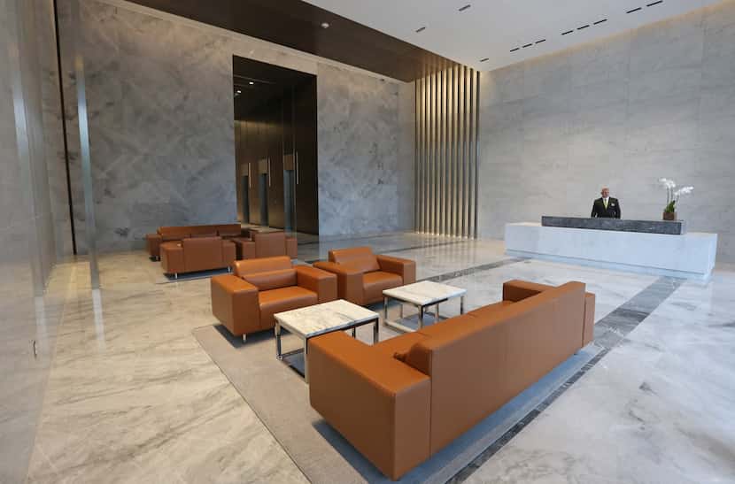 The spacious lobby of 1900 Pearl Tower, the newest
downtown Dallas office building, at Pearl...