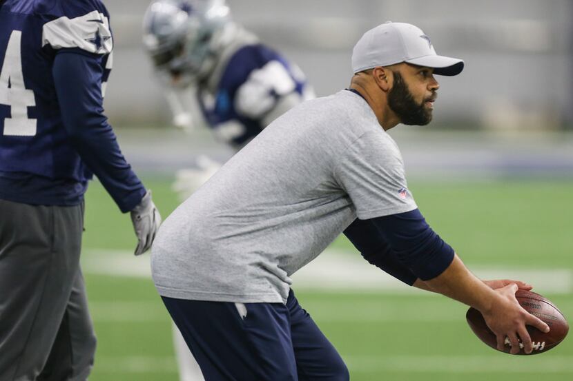 Defensive backs coach Kris Richard works with players during team practice Tuesday, January...