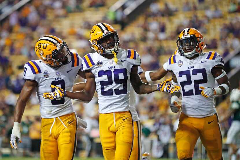 FILE - In this Sept. 8, 2018, file photo, LSU cornerback Greedy Williams (29) celebrates his...