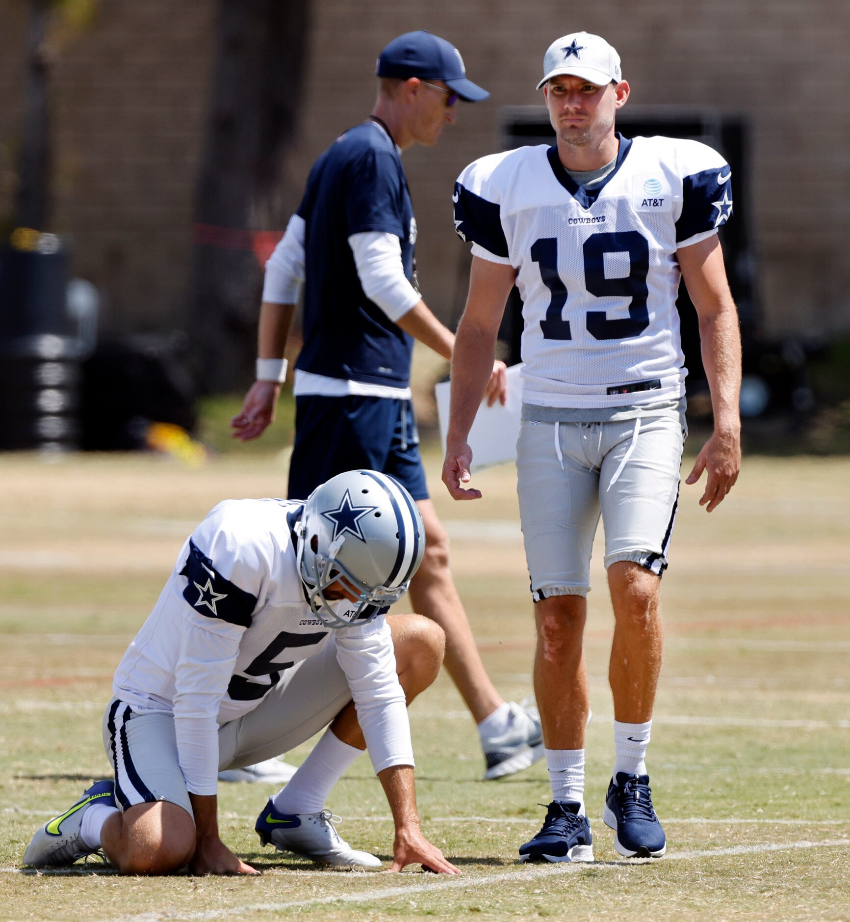 Dallas Cowboys newly singed kicker Brett Maher (19) lines up a kick during training camp...