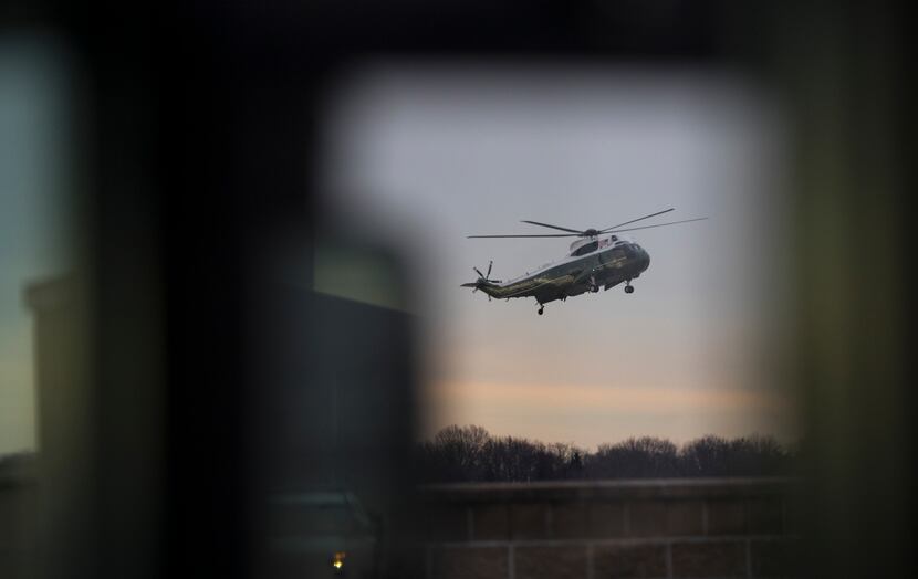 Marine One, carrying President Donald Trump, arrives at Dover Air Force Base to be present...