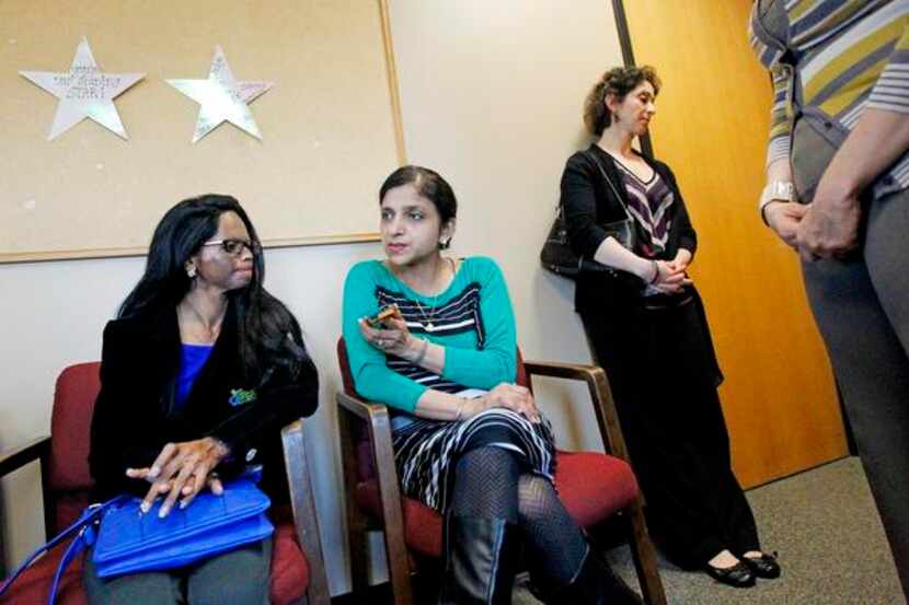 
 Laxmi  (left), State Department interpreter Gurdeep Chawla (center) and Assia Belhadi with...