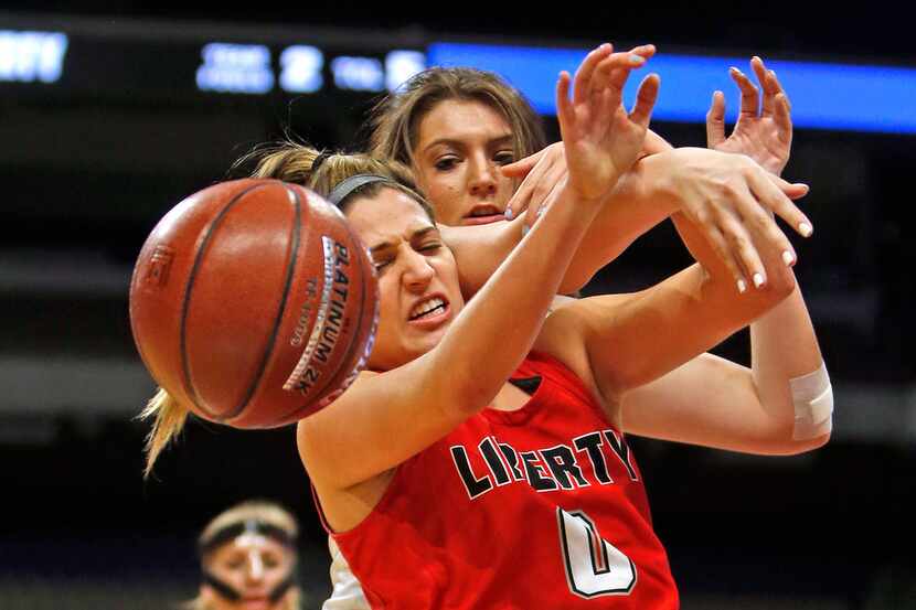 Libertyâs Alyssa Nayar battles Kerville's Catherine Kaiser for a rebound. Kerrville Tivy v...