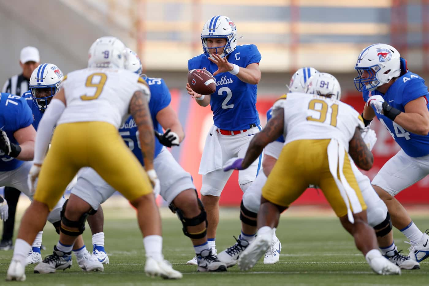 SMU quarterback Preston Stone (2) takes the snap during the first half of an NCAA football...