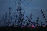 Transmission power lines are down near the Grand Parkway and West Road after a storm...