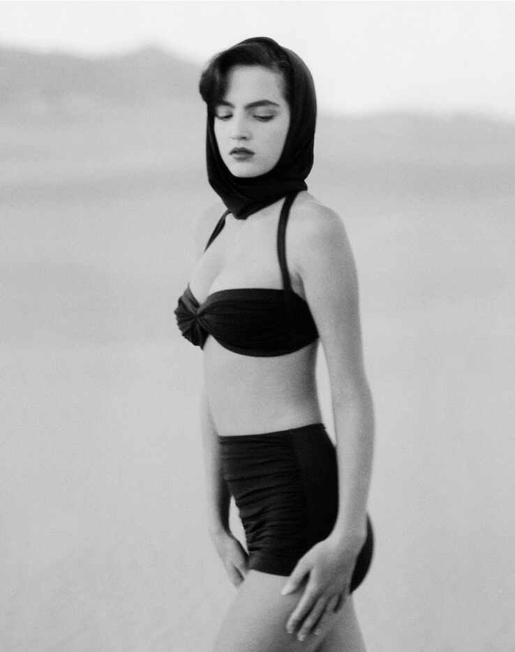 Model Chandra North photographed on sand dunes near Palm Springs in 1990 for American...