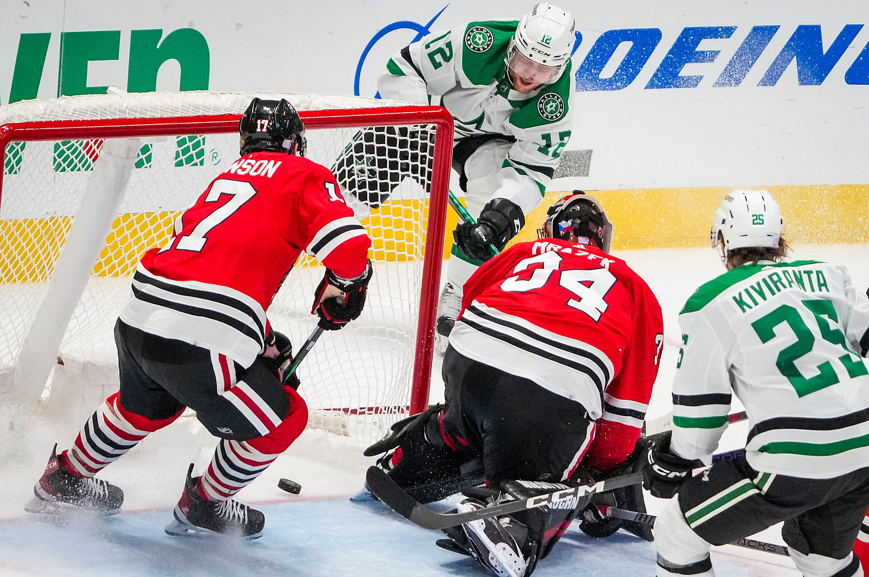 Dallas Stars center Radek Faksa (12) scores the go-ahead goal past Chicago Blackhawks...