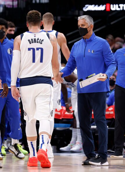 Dallas Mavericks assistant coach Igor Kokoskov (right, at a home game against the Utah Jazz...