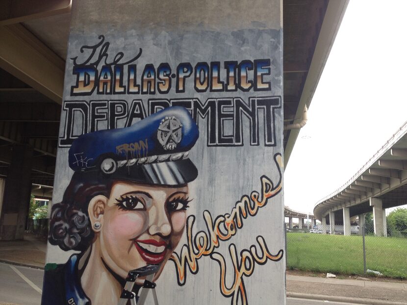 The DPD Mural in Deep Ellum before local artist Steve Hunter fixed the cap. 