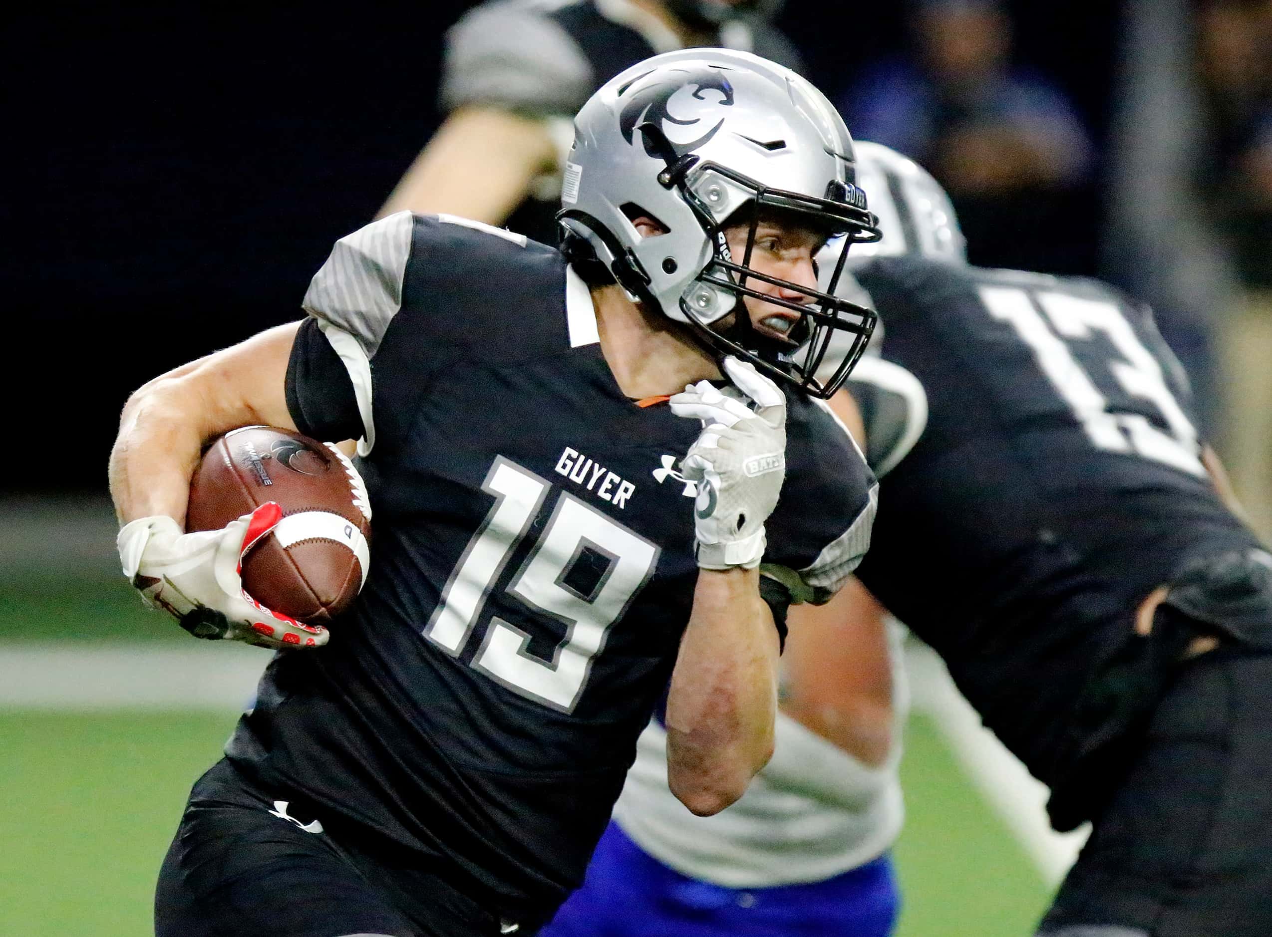 Guyer High School wide receiver Grayson Obara (19) runs a reverse for a first down during...