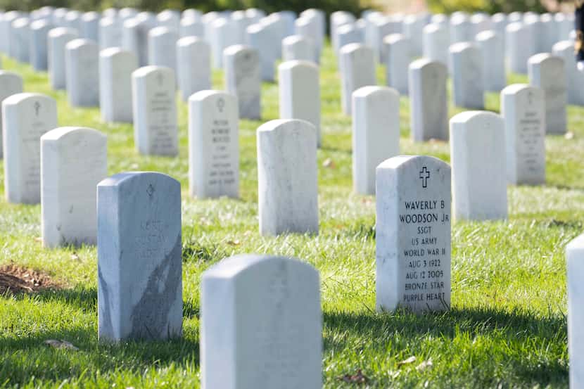 The headstone of Cpl. Waverly B. Woodson Jr. is seen during a ceremony at Arlington National...