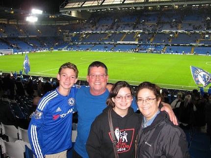 Marshall Dickson (left) poses for a picture with his family. From left to right are his...