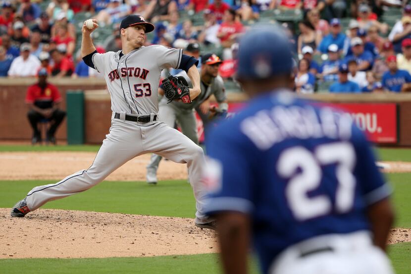 Houston Astros relief pitcher Ken Giles pitches during a Major League Baseball game between...