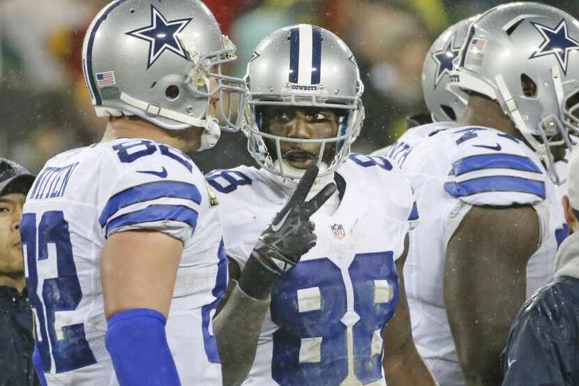 Dallas Cowboys wide receiver Dez Bryant (88) talks with tight end Jason Witten (82) during a...