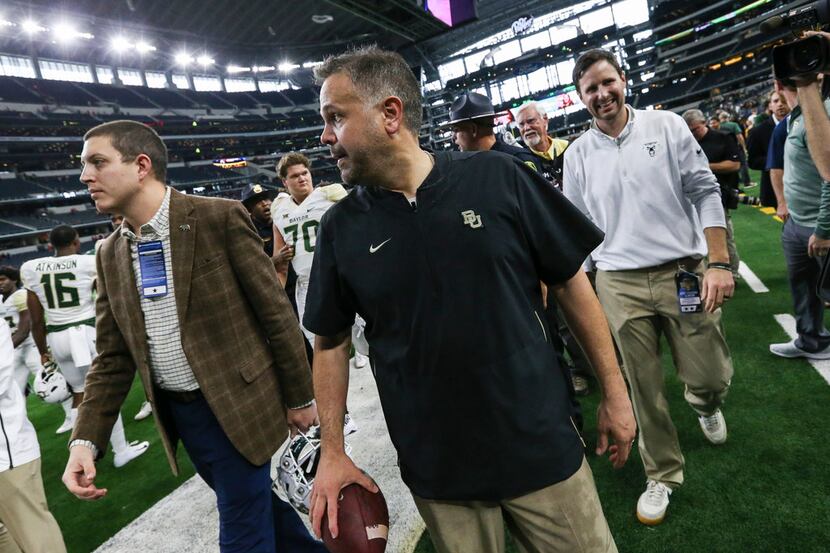 Baylor Bears head coach Matt Rhule makes his way off the field following the Baylor Bears...