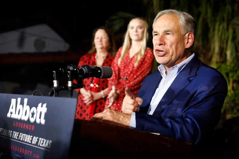 Joined by his daughter Audrey Abbott and wife Cecilia Abbott, Texas Governor Greg Abbott...
