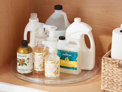 Turntable organizer in a bathroom cabinet with bottles on it