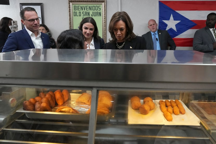 Democratic presidential nominee Vice President Kamala Harris, from right, visits Old San...