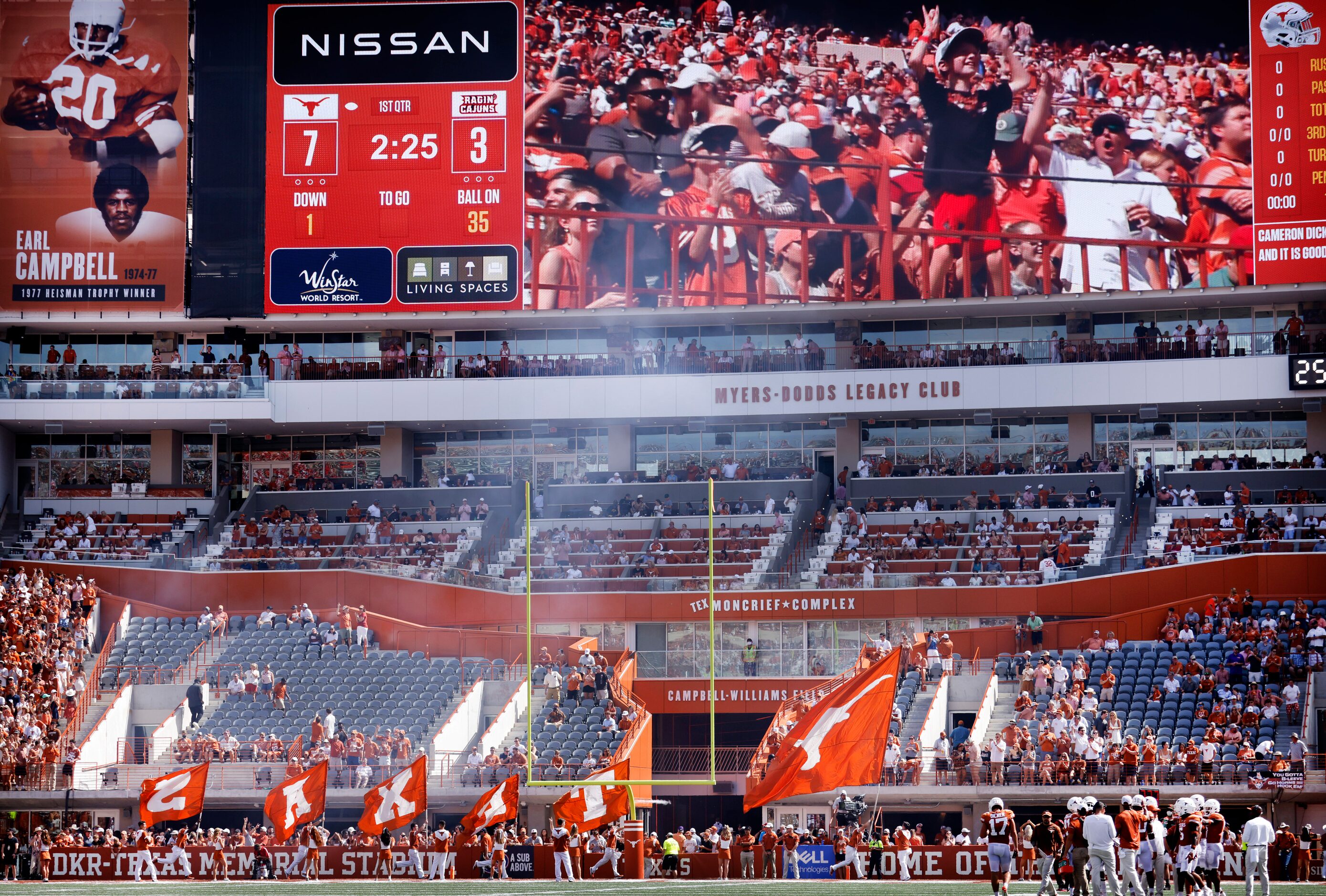 Texas Longhorns fans celebrate the first touchdown of the season against the...