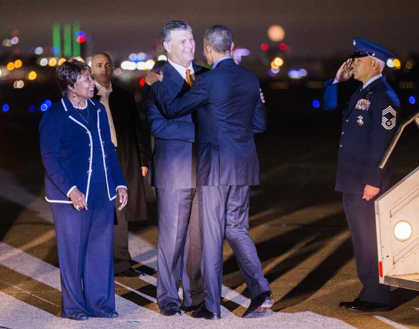 President Barack Obama greeted Dallas Mayor Mike Rawlings and U.S. Rep. Eddie Bernice...