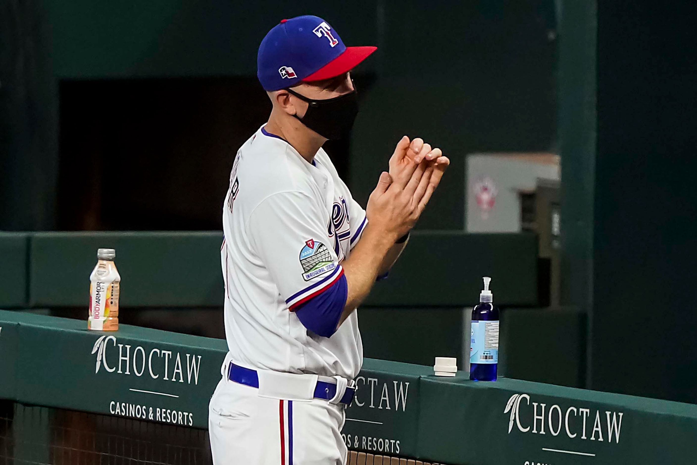 Third baseman Todd Frazier uses hand sanitizer during Texas Rangers Summer Camp at Globe...