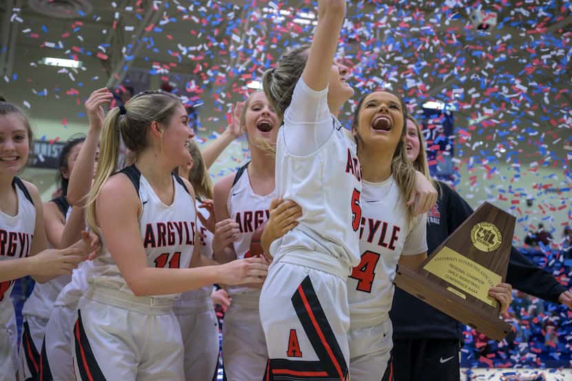 Guard Abby WIlliams celebrates with Rhylie McKinney after winning the Class 4A Region 1...