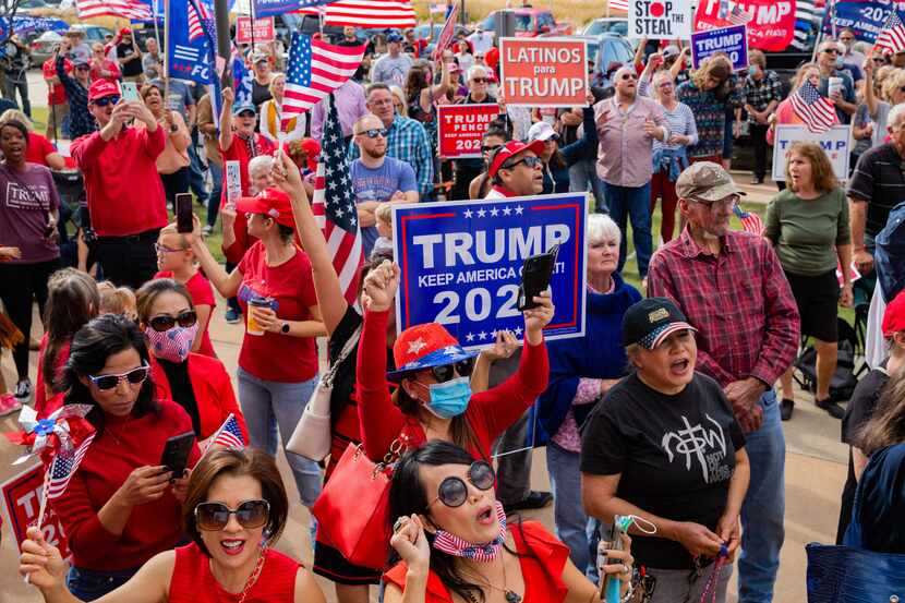 Trump supporters gather for an America is Great rally hosted by TrumpTrain 2020 DFW at...