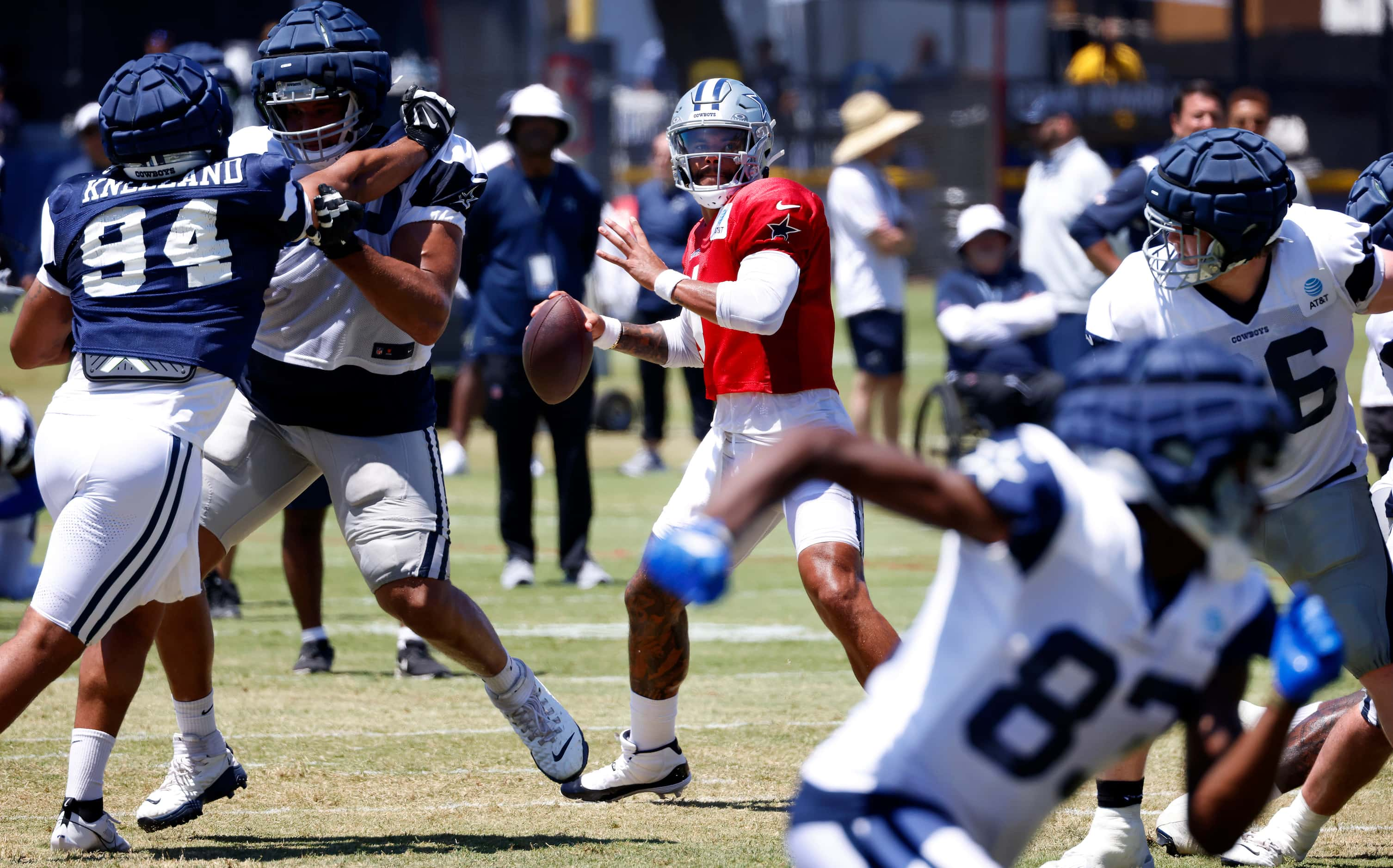 Dallas Cowboys quarterback Dak Prescott (4) looks for wide receiver Jalen Brooks (83) to get...