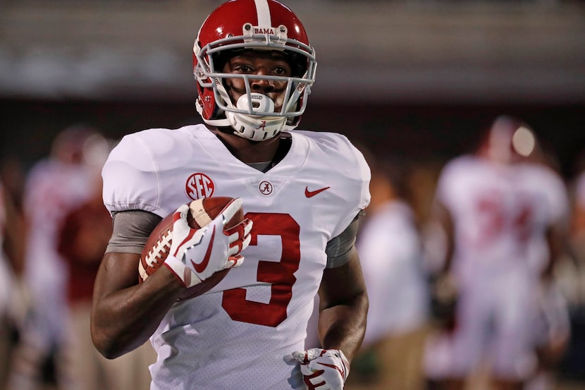 FILE - In this Nov. 11, 2017, file photo, Alabama wide receiver Calvin Ridley (3) runs...