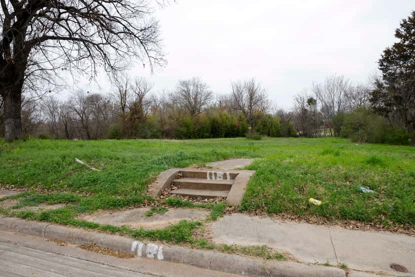 Stairs lead up to an empty lot on Betterton Circle in the Tenth Street Historic District in...