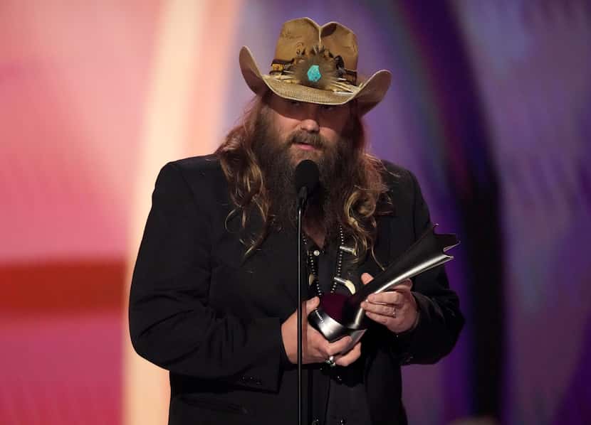 Chris Stapleton accepts the award for entertainer of the year at the 58th annual Academy of...