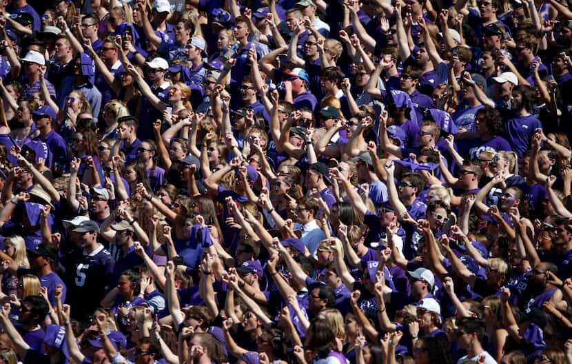 TCU fans cheer for their team against Iowa State during the first quarter at Amon G. Carter...