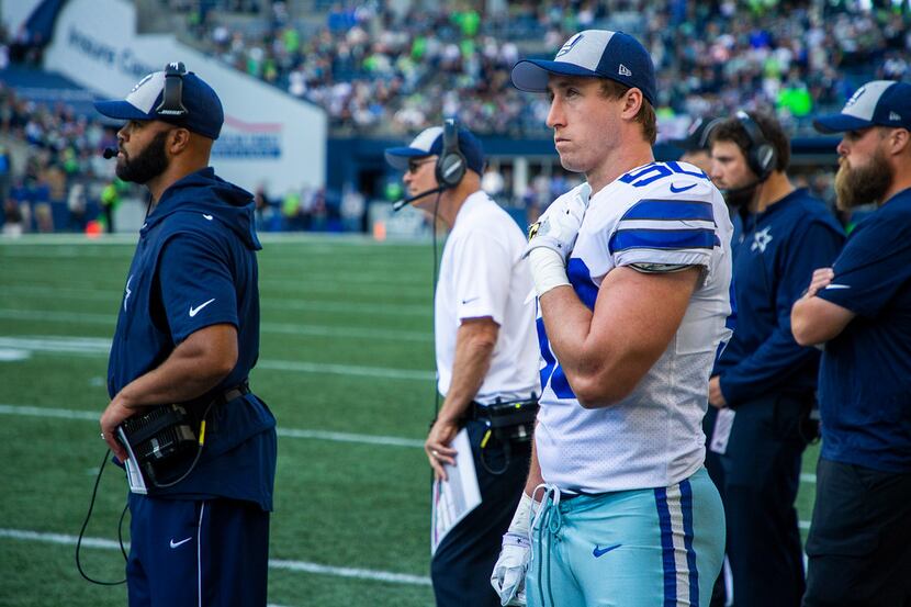 Dallas Cowboys linebacker Sean Lee (50) watches from the bench during the second half of an...