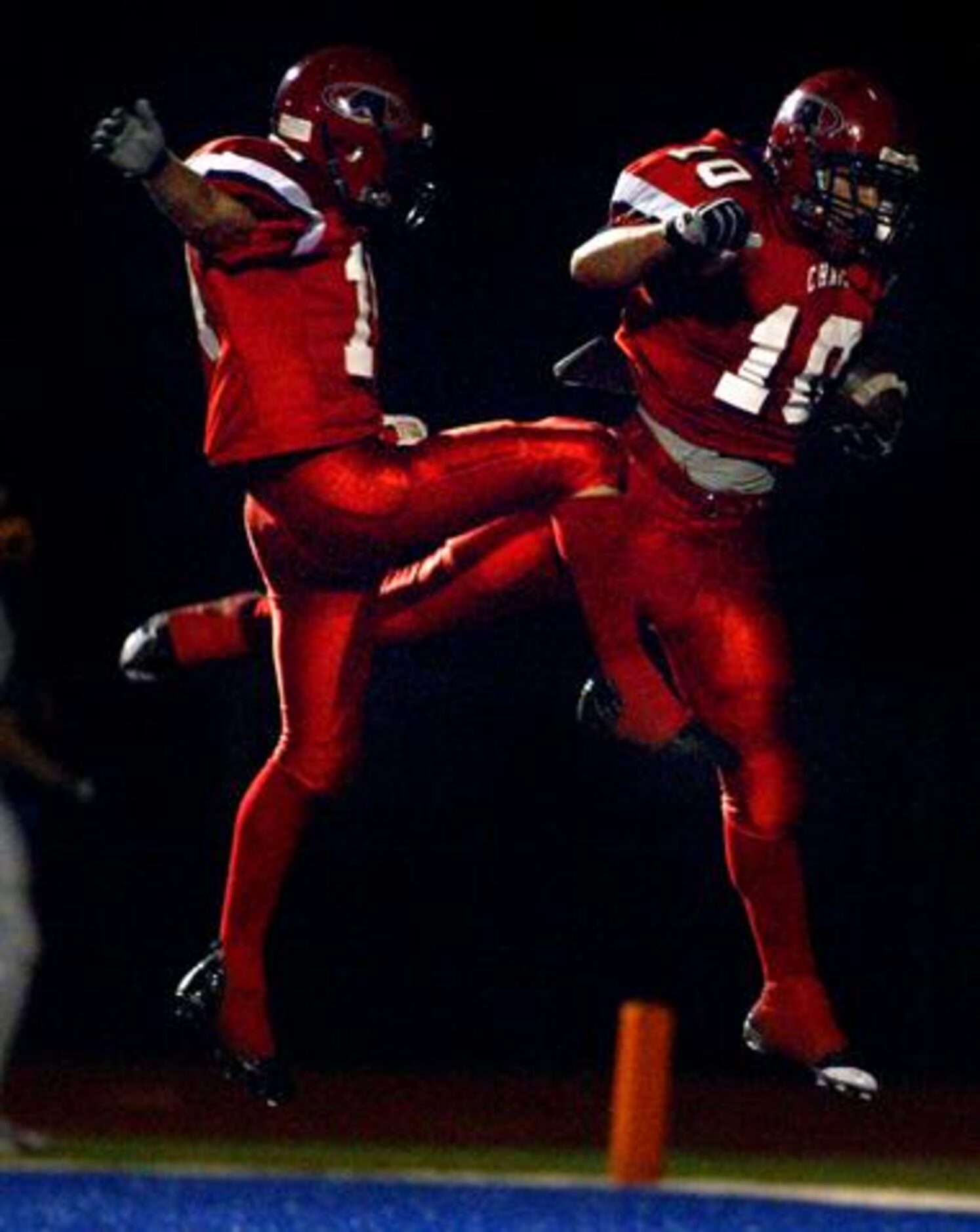 Aubrey's Skyler Craig (10) and Jordan Starling celebrate Craig's touchdown against Nevada...