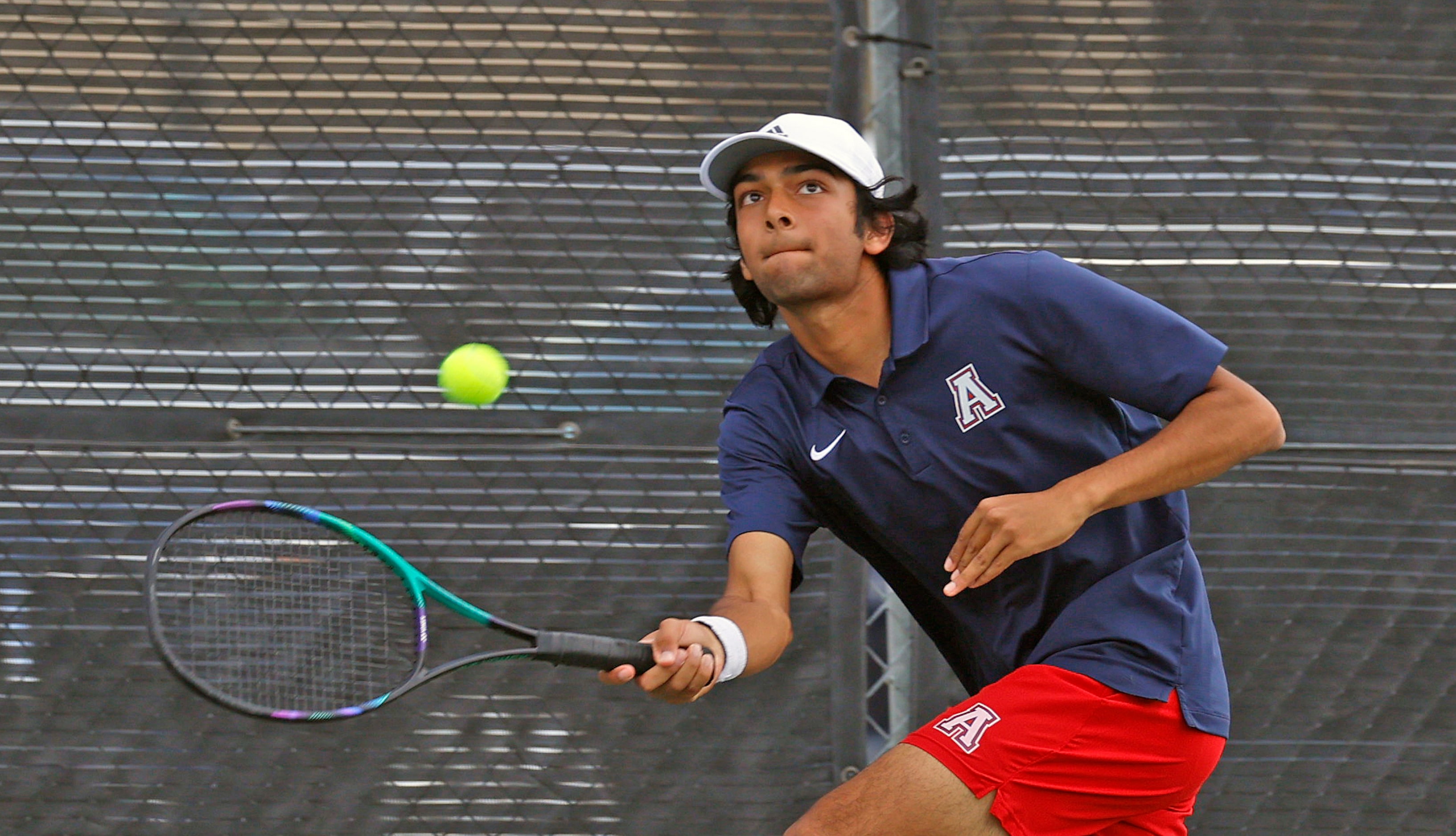 In Class 6A boys doubles Allen’s Tejas Ram make a return against Woodlands’ Jose Perez and...