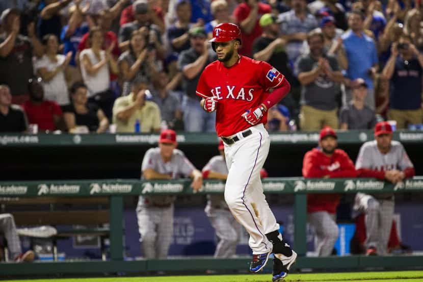 Texas Rangers right fielder Nomar Mazara (30) rounds the bases after hitting a home run...