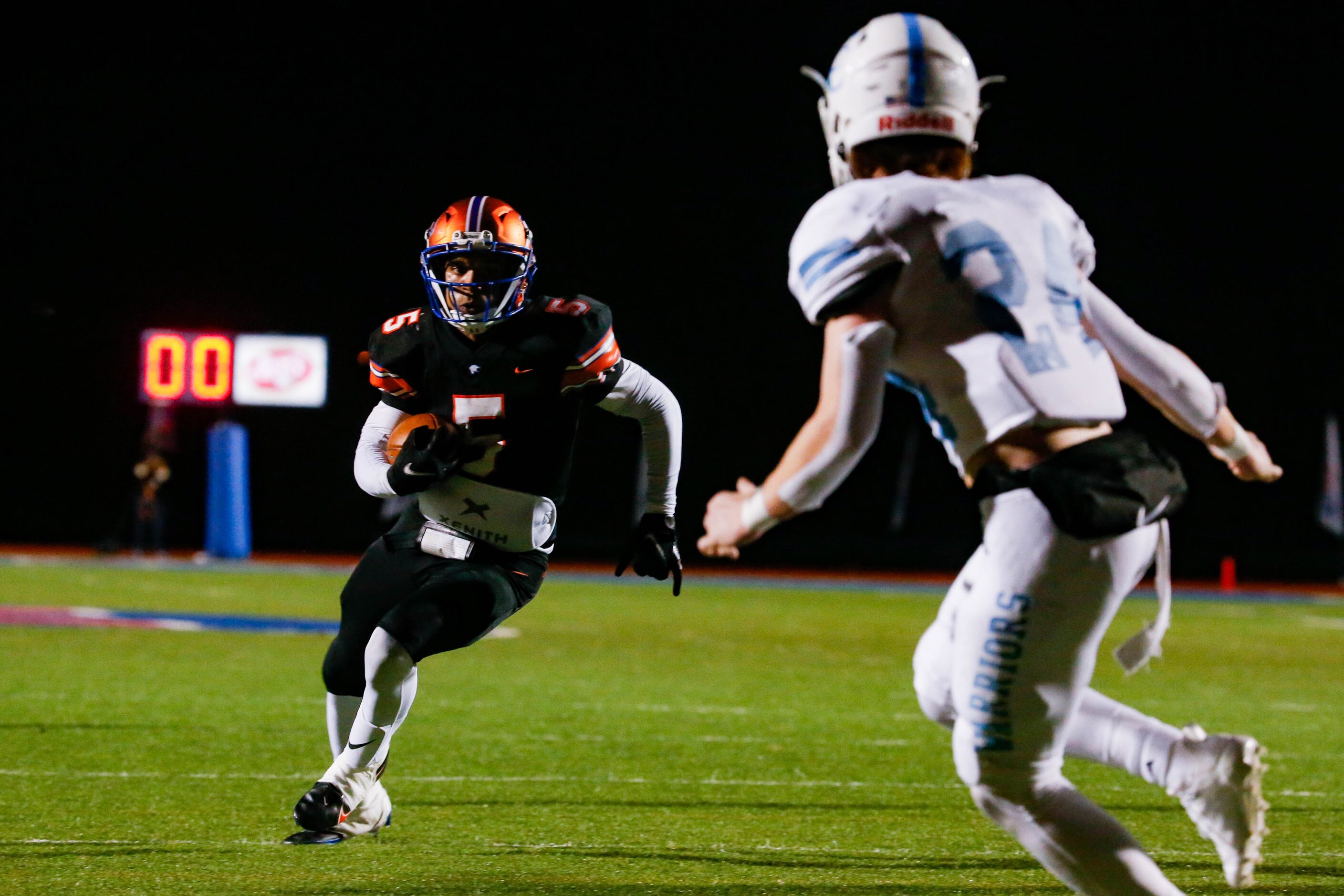 Colleyville Covenant's Jackson Owen (5) squares up against Cypress Christian's Brady Forcey...