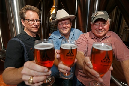 (from left to right) Brewmaster Grant Wood, founders Rhett and Ron Keisler, of Revolver...